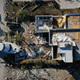 A yacht sits run aground in the front yard of a destroyed home in Fort Myers, Florida on Sunday, October 2.